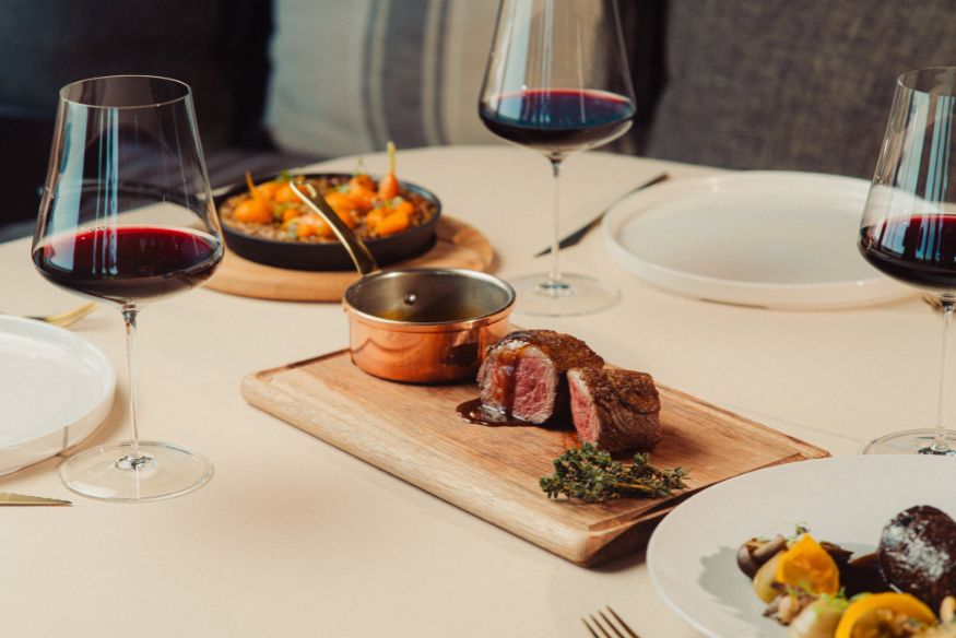 Preceito Restaurant at Palmares Ocean Living & Golf dinner table
